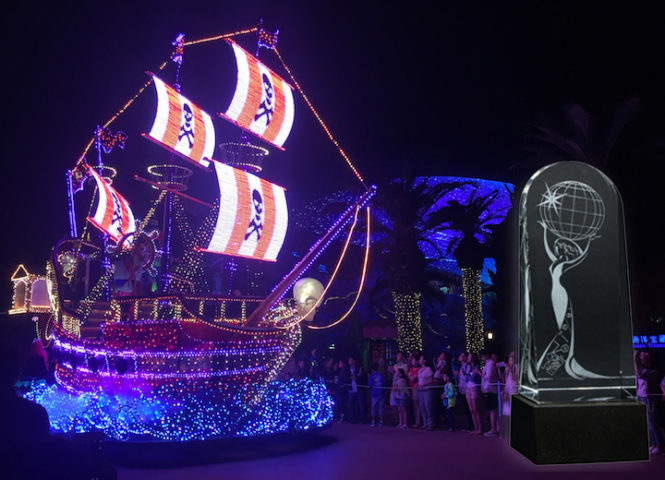 A dazzling, illuminated pirate ship from the "Journey of Lights" parade.