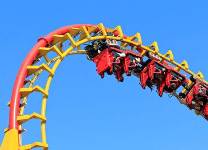 A roller coaster with people upside down from the film, Thrill Ride The Science of Fun