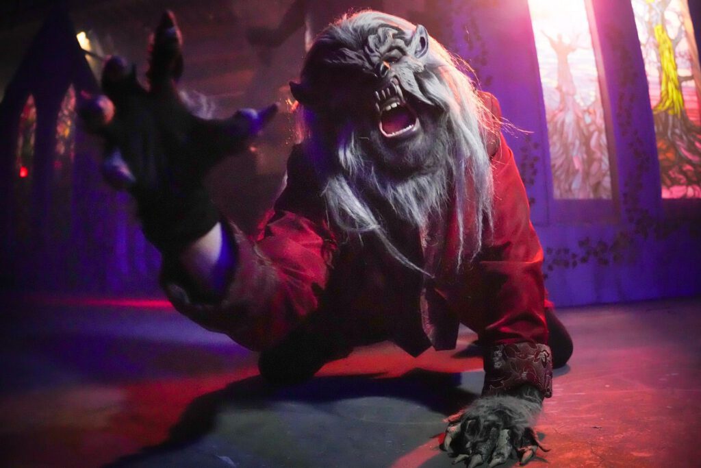 A growling, scary creature clawing at you. A character from the Onionhead's Revenge Haunted House